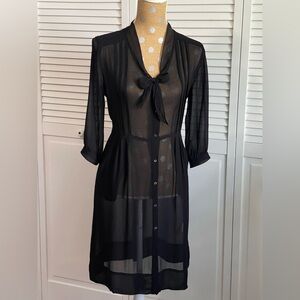 Wrap Designed in London 3/4 sleeve black sheer tailored lines and amazing neck